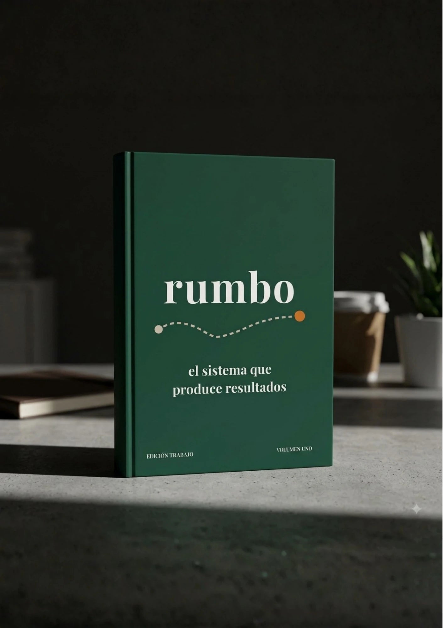 El cuaderno rumbo sobre una superficie de hormigón oscuro.
